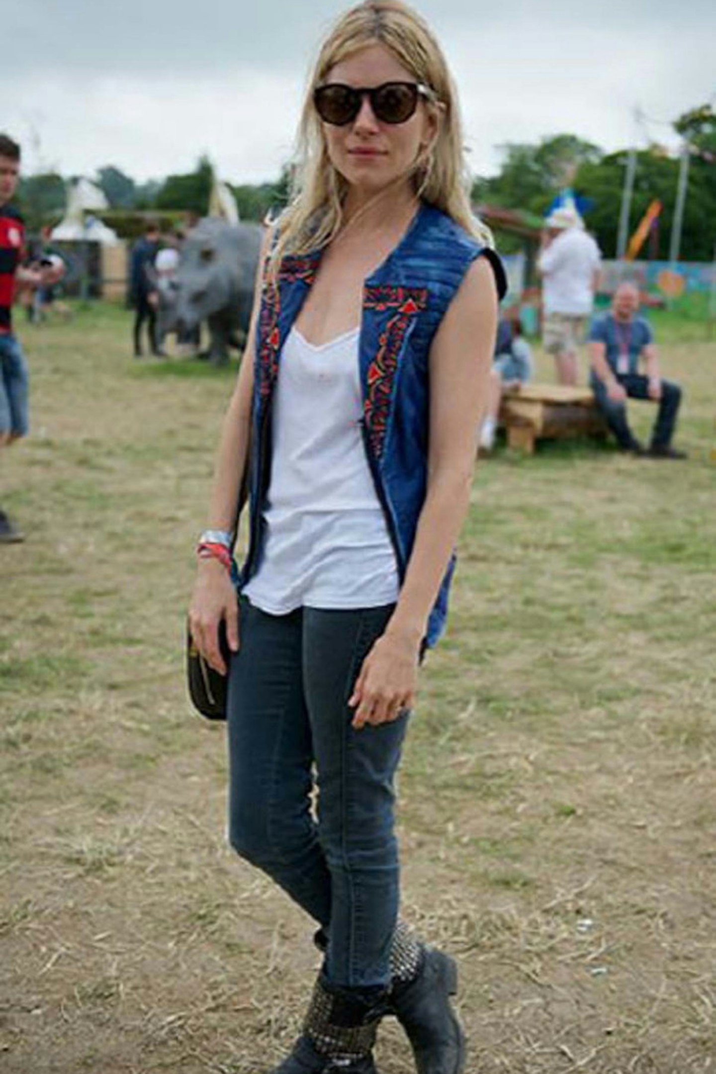 24-Sienna Miller in Topshop dress with a Anya Hindmarch Bathurst bag at Glastonbury - 29 June 2013