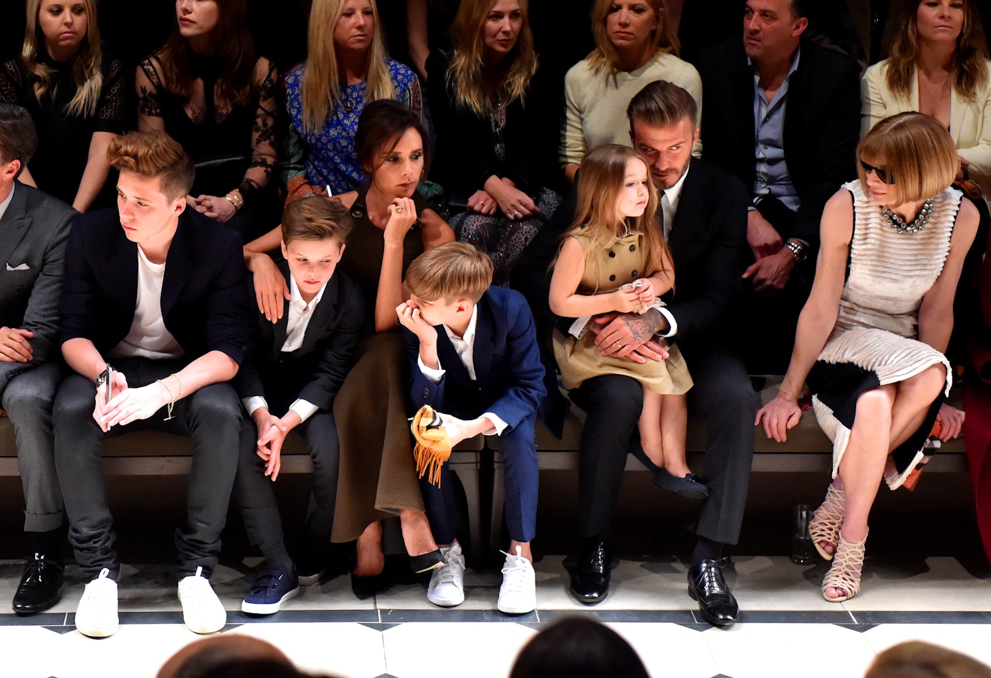 The Beckham family on the front row at Burberry [Getty]