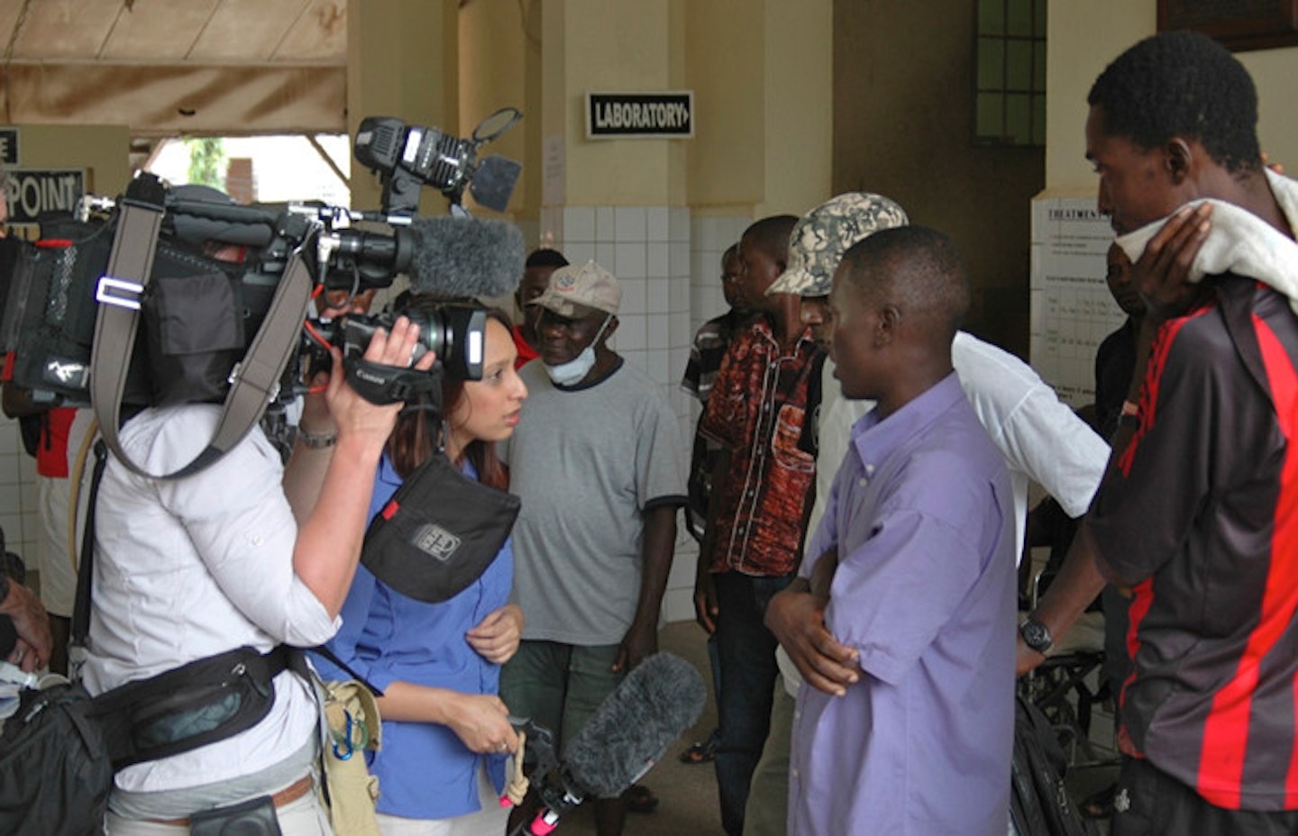 Tulip talks to locals in the Connaught hospital in Sierra Leone.