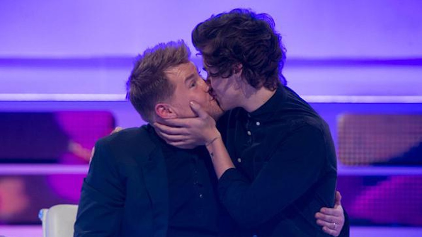 Harry and James create their own kiss cam moment