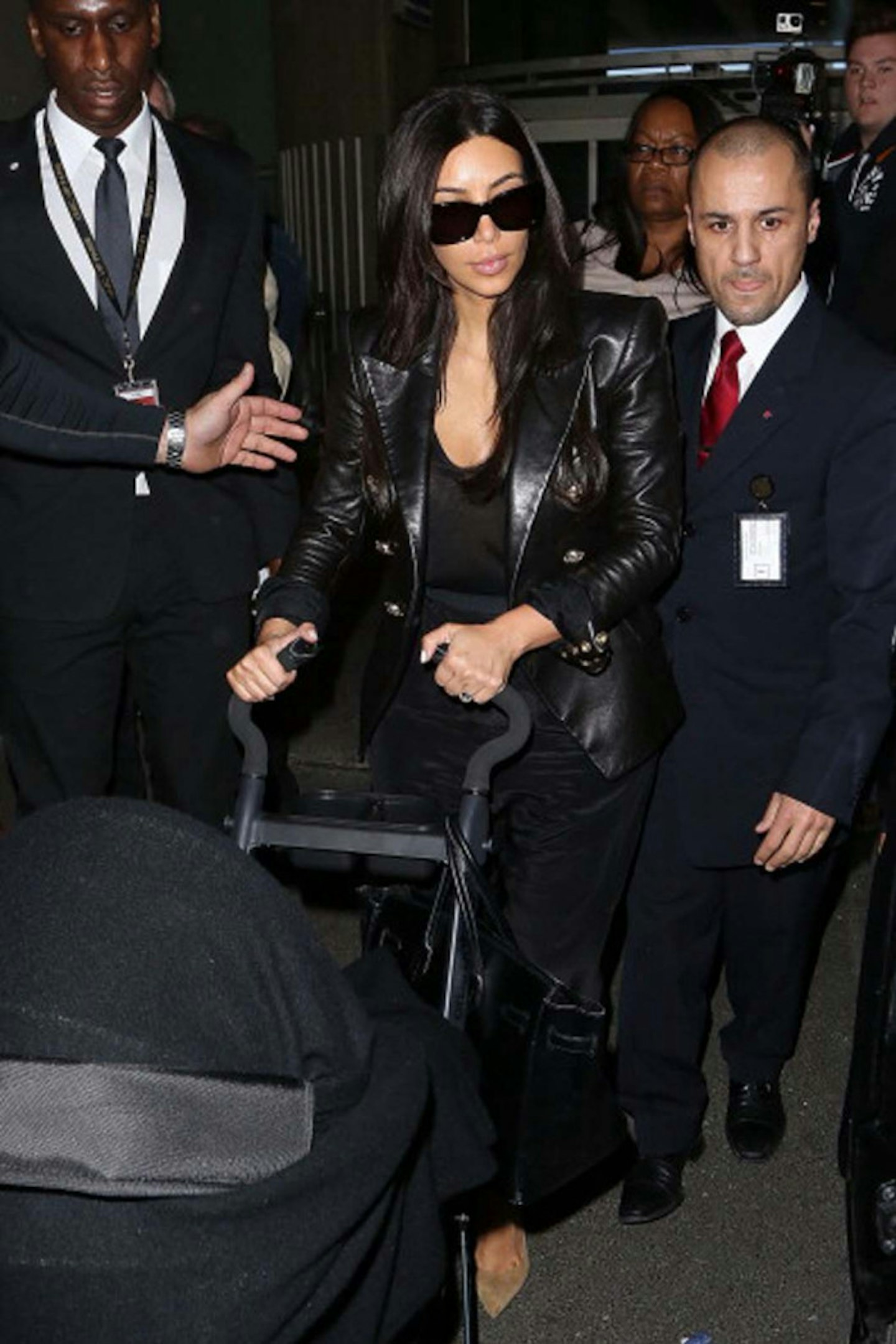 Kim Kardashian style black leather jacket sunglasses