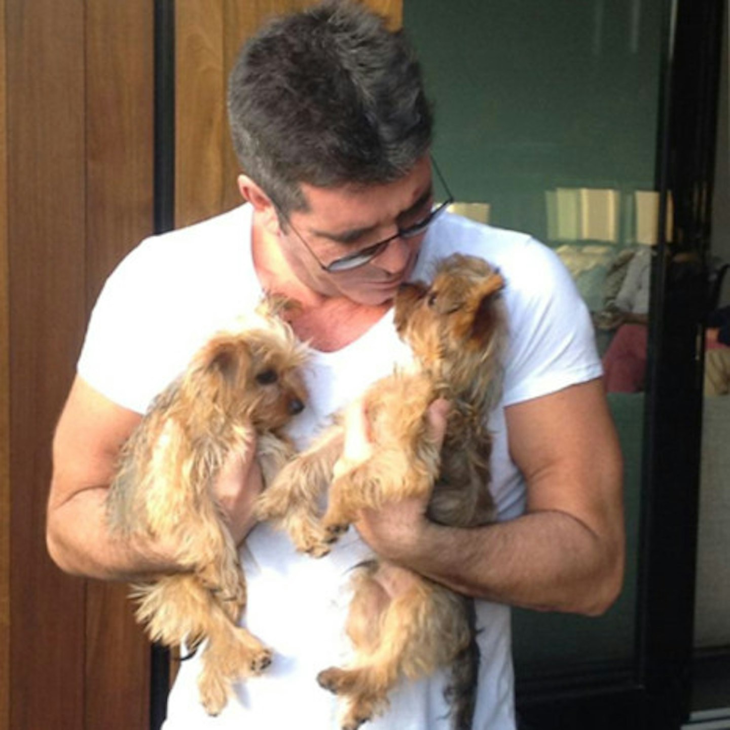 Simon will his beloved pups Squiddly and Diddly