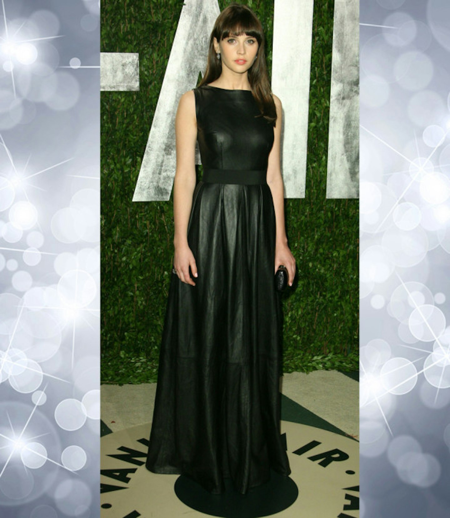 felicity-jones-best-outfits-black-wet-look-maxi-dress