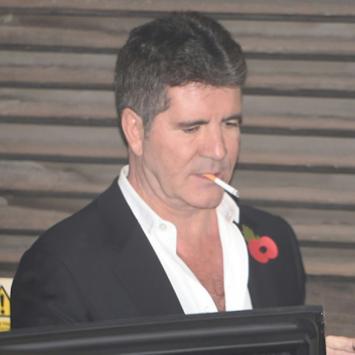 Simon has to pay £100 every time he lights up at work