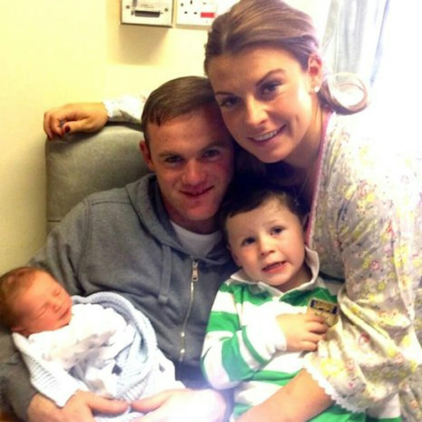 Coleen and Wayne Rooney with their two sons, Kai and baby Klay
