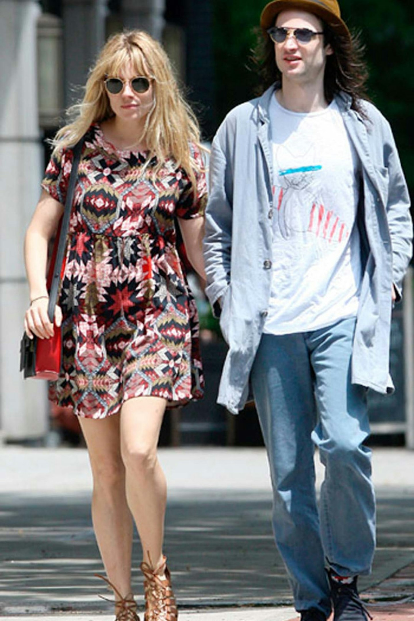 24 3- Sienna Miller in Topshop dress with a Anya Hindmarch Bathurst bag at Glastonbury - 29 June 2013
