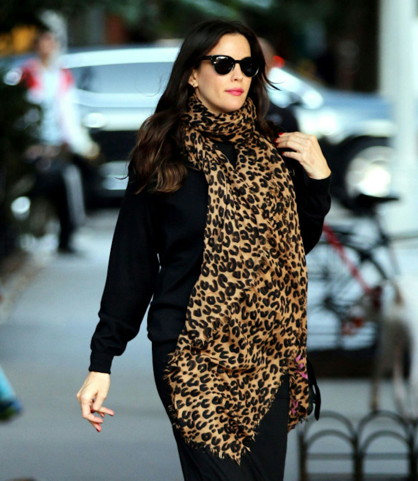 A leopard print scarf? Really? There's no fooling us Liv