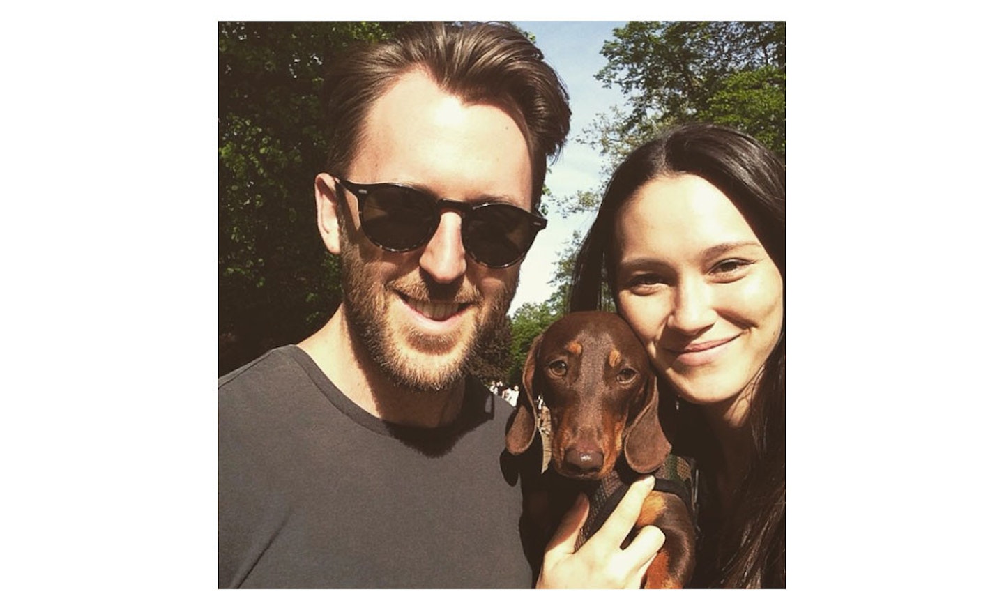 Lee with his fiancee and dog, Teddy.