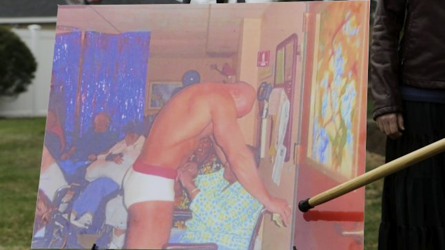 This image of Ms Youngblood receiving a lap dance from a male stripper started the investigation