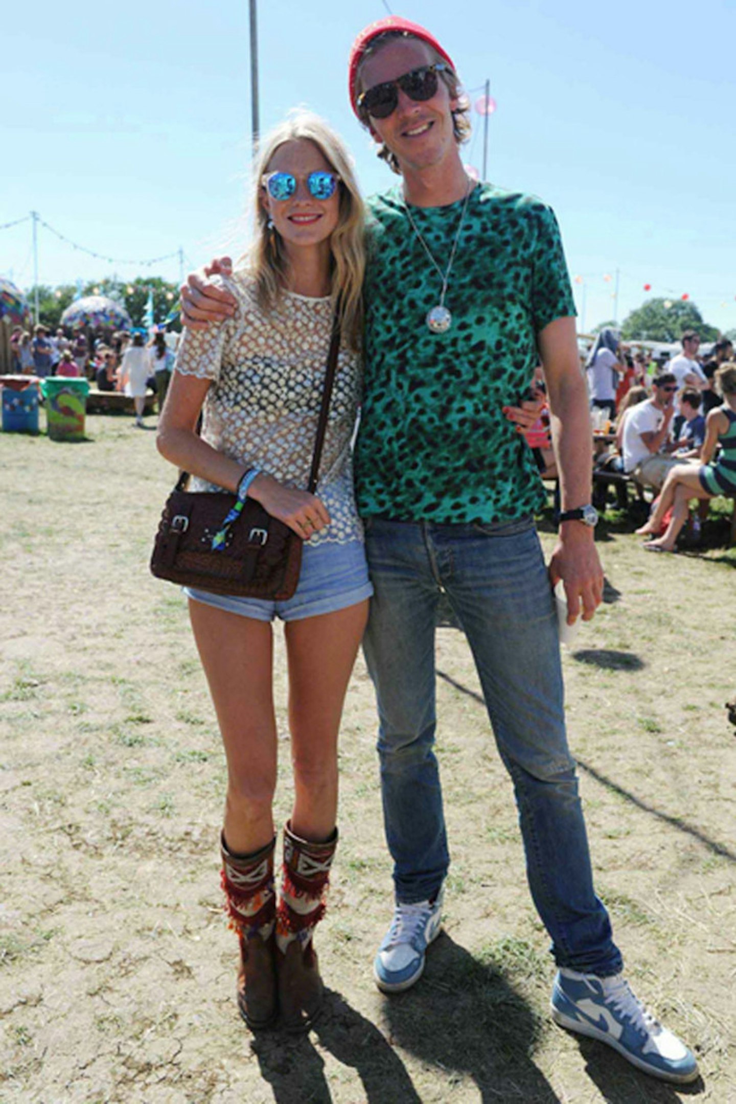 Poppy Delevingne in a Kate Spade white lace top, with Kate Spade New York bag and Le Specs sunglasses