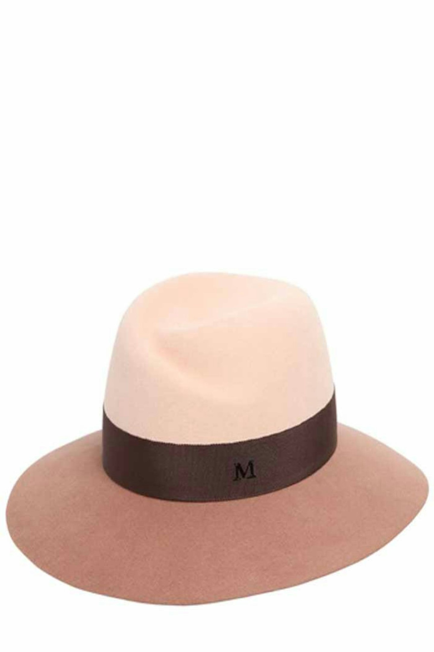 We are massive fans of Maison Michel over here at Grazia HQ. Almost any head is a better head when adorned with one of these hats. Love the colour-blocking on this pink number.