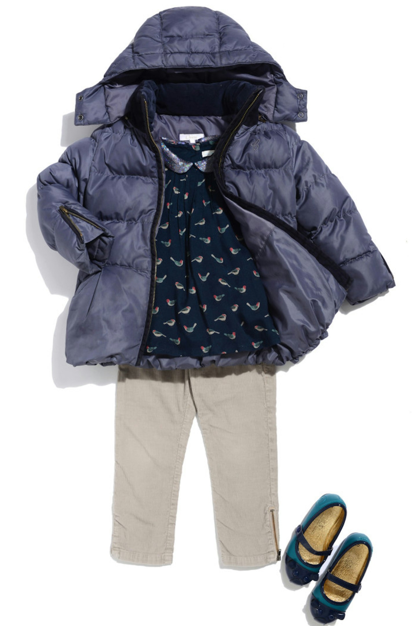 Bonpoint grey cords with a Marie Chantal bird/sequin shirt, Chloe puffa coat and Marc Jacobs green/blue pumps