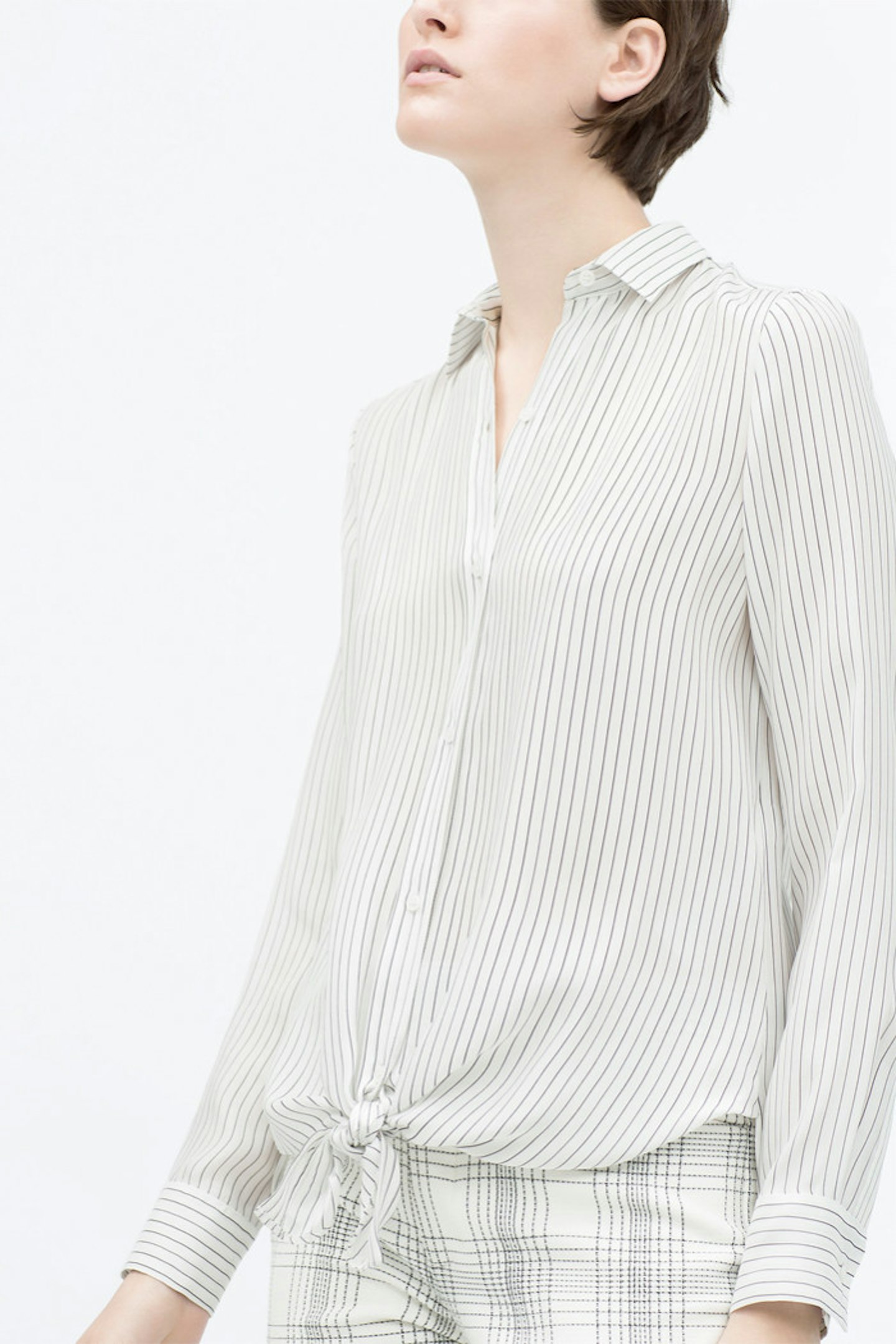 GraziaDaily contributor Rebecca Kelsey: 'I'm a sucker for a silk shirt, so was instantly drawn to this little stripy number. Perfect over a pair of silk shorts during summer, it'll carry me through to autumn nicely when swapped for a pair of leather joggers. A timeless classic.'