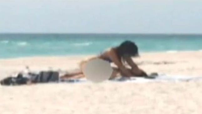 Couple arrested after being filmed having sex on a crowded beach %%channel_name%% picture