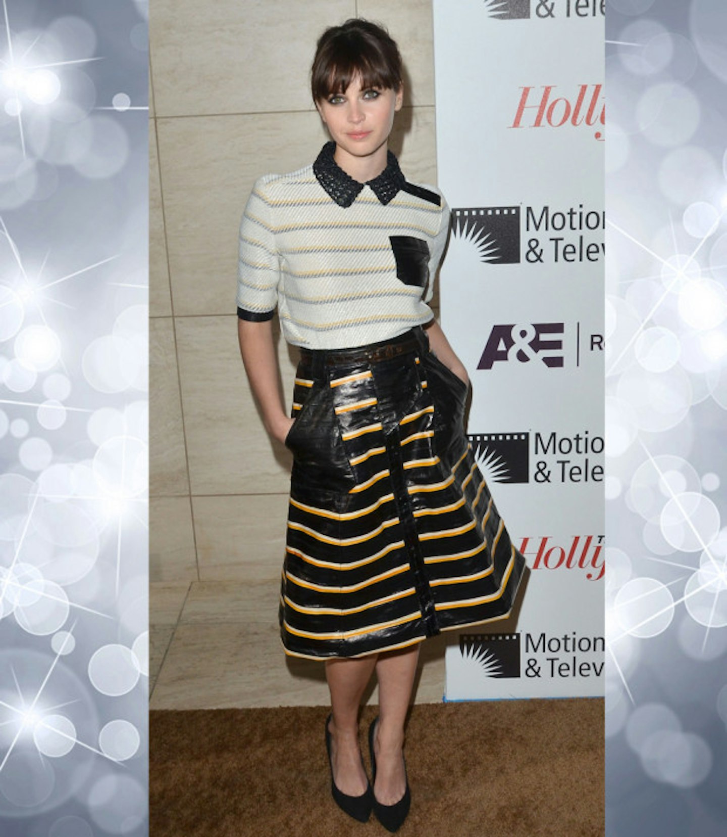 felicity-jones-best-outfits-stripe-top-stripe-leather-skirt