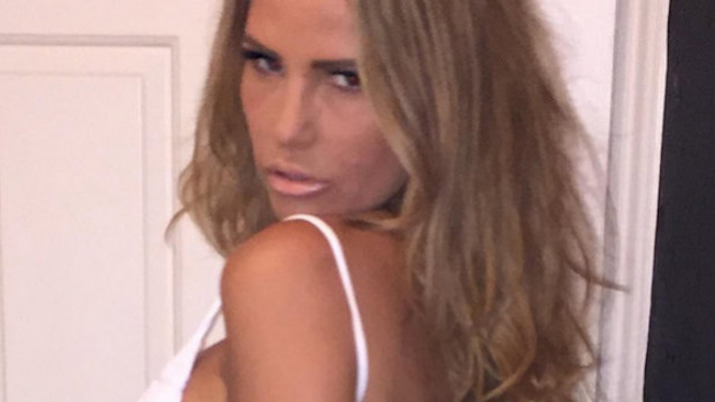 Katie Price boobs out white dress backless