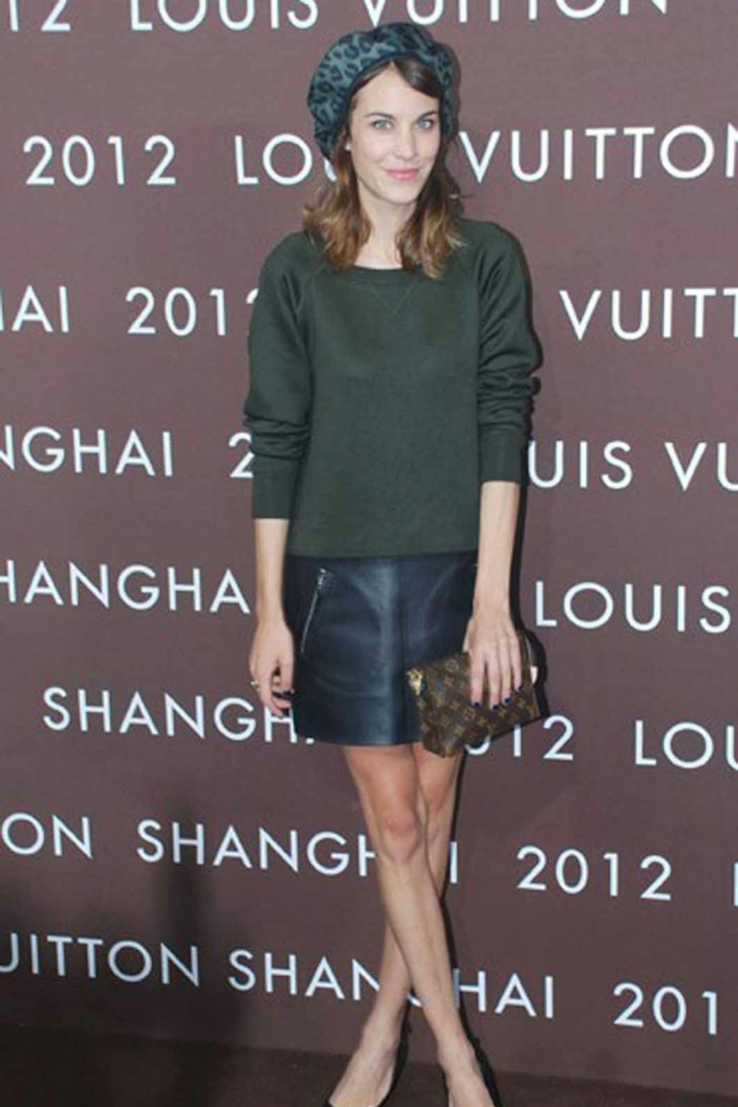 Alexa Chung style green jumper leather skirt