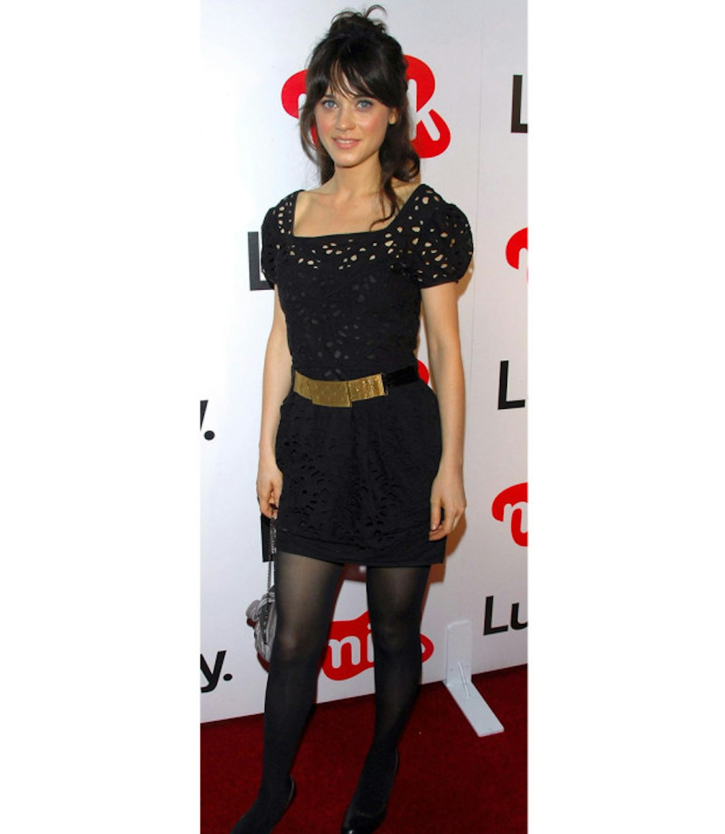 zooey-deschanel-before-stylist-black-laser-dress-gold-belt