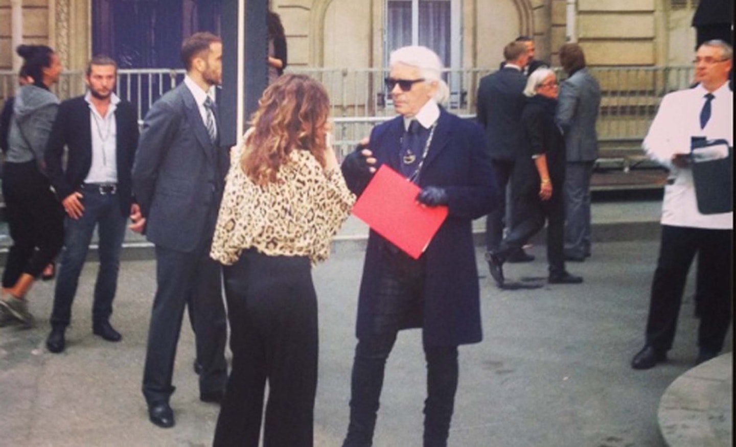 @Grazia_Live: And here's the man himself: Karl Lagerfeld having a natter on Boulevard Chanel after the show.