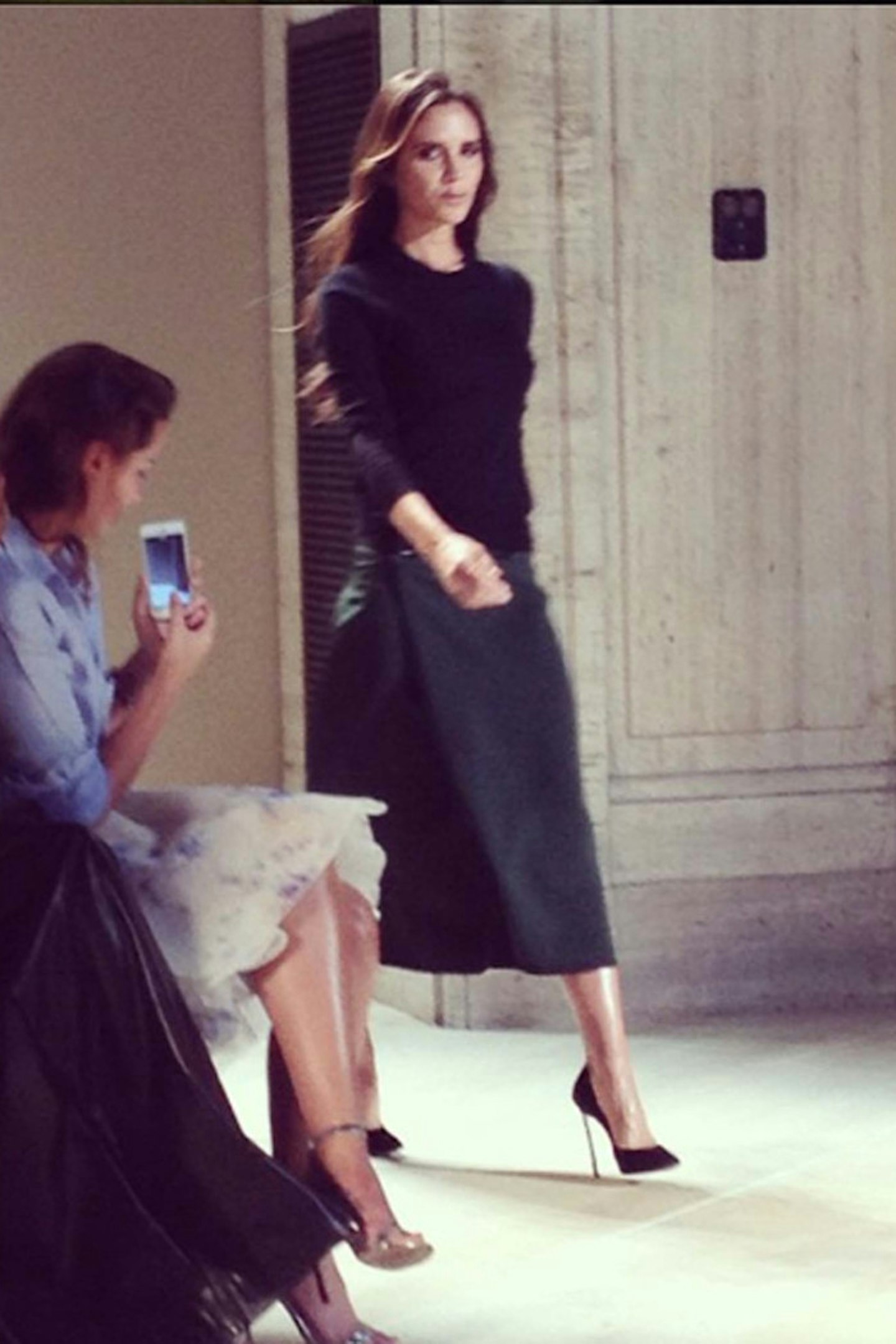 @grazia_live Victoria looking ultra glossy in ine of her midi skirts walking out at the end of her #NYFW show