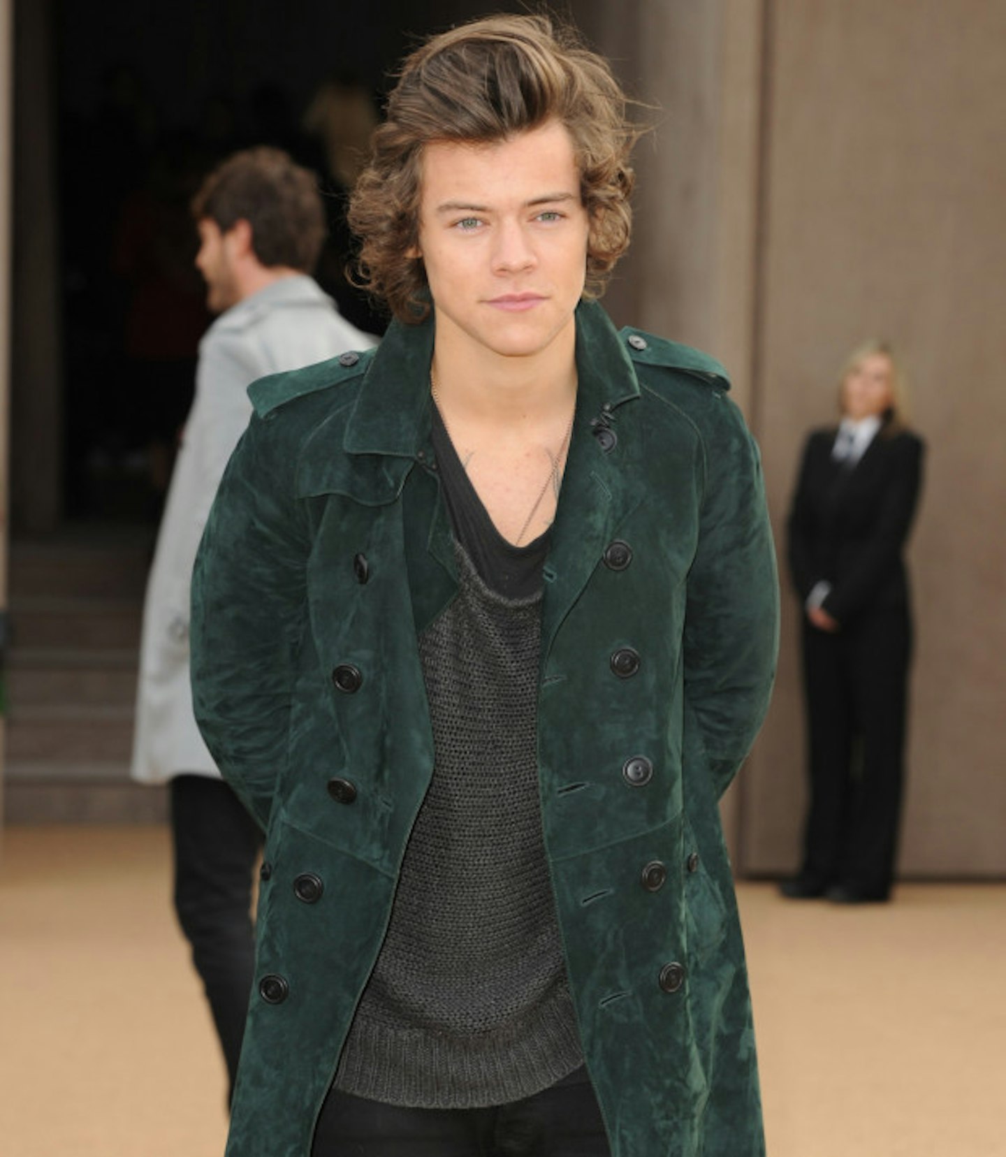 harry-styles-green-coat-black-trousers