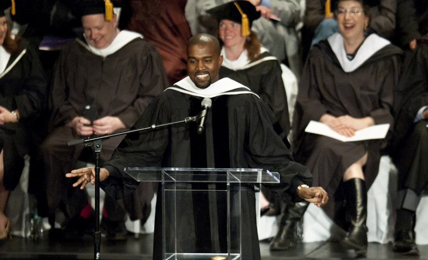 Kanye at his graduation [Getty]