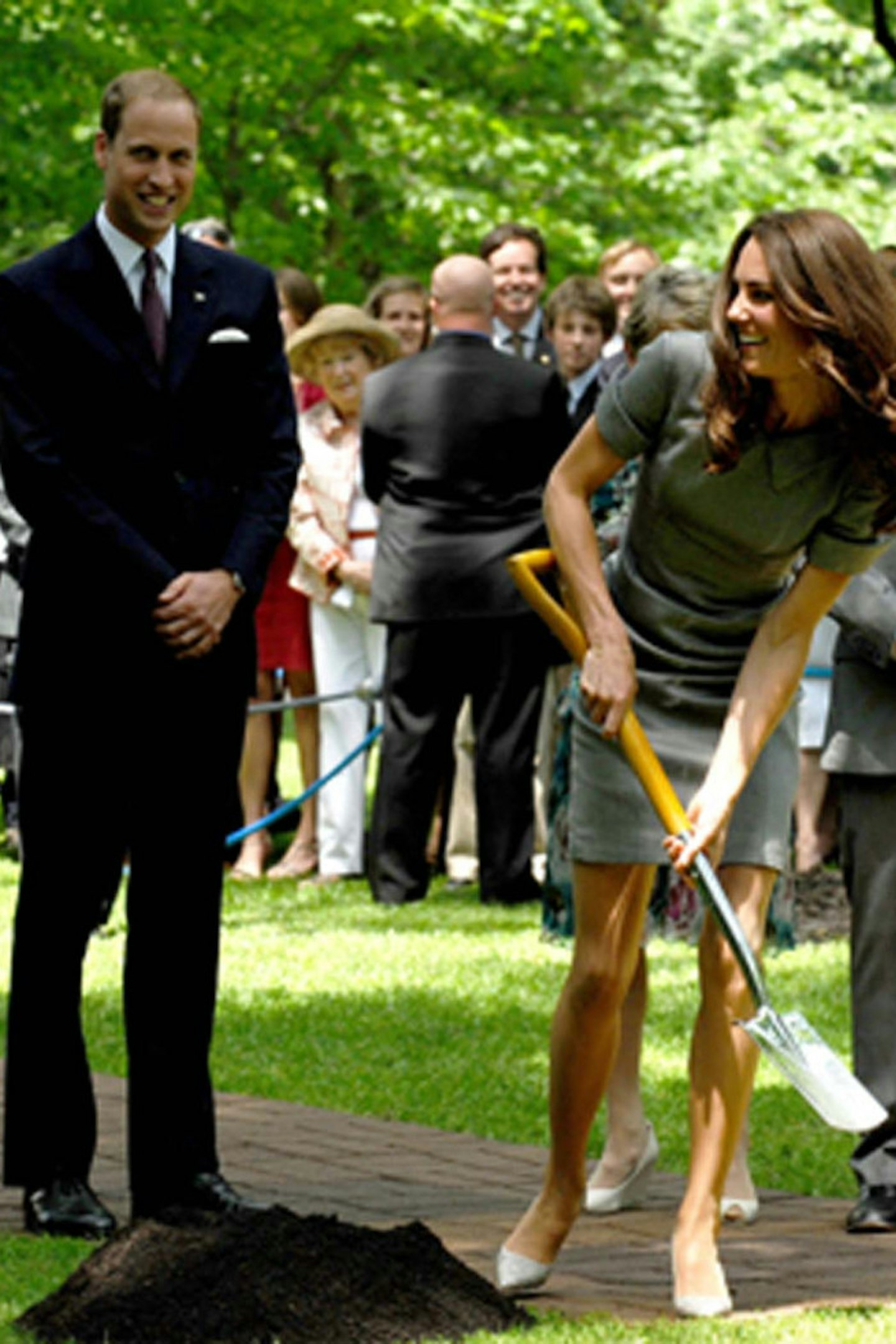 12-11. Planting a tree while dressed in their finest in July 2011