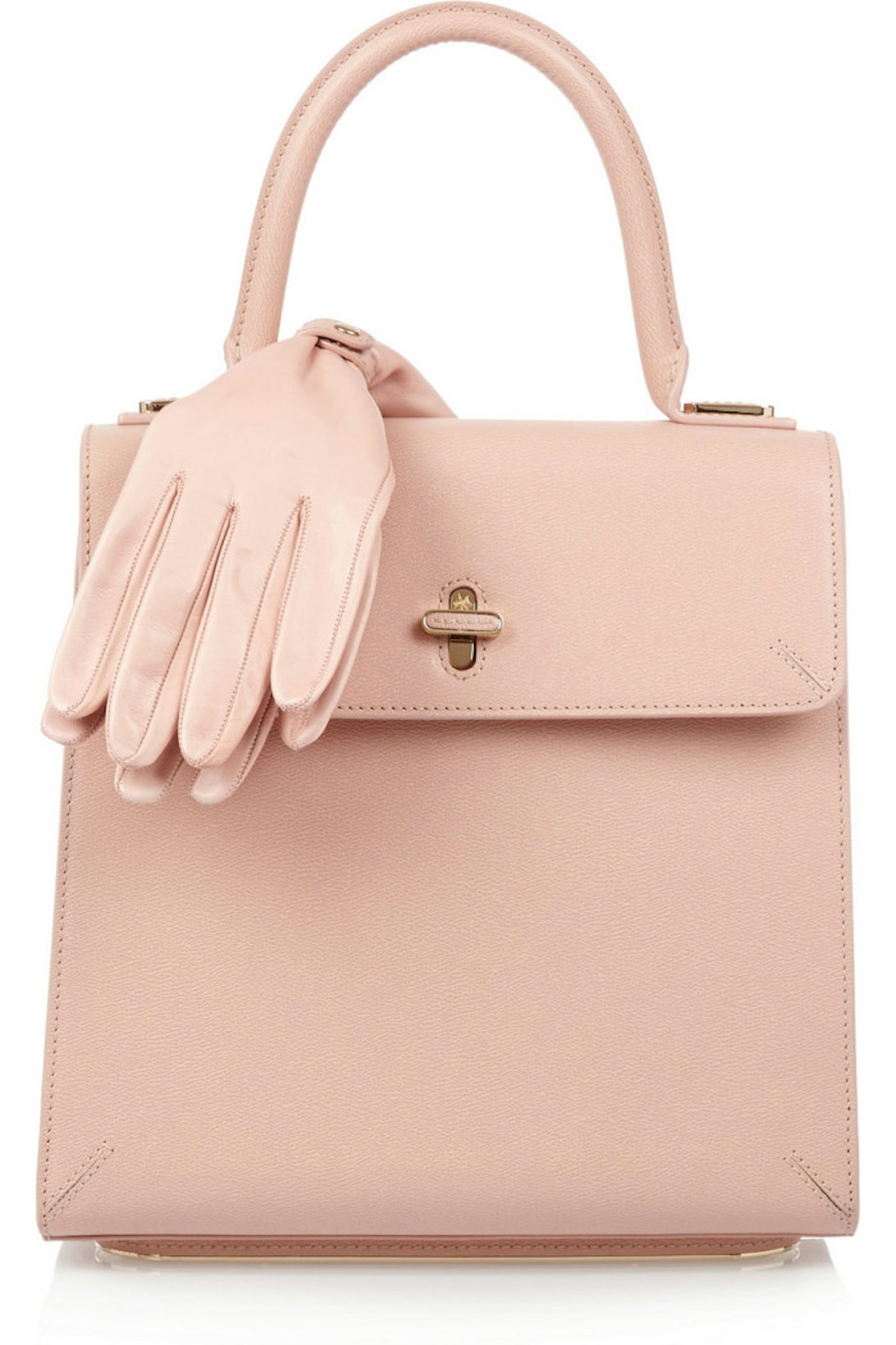 If Jackie Onassis were a bag! Do like the fabulous former First Lady and go all prim and proper. Wear with mid heels and a pencil skirt.