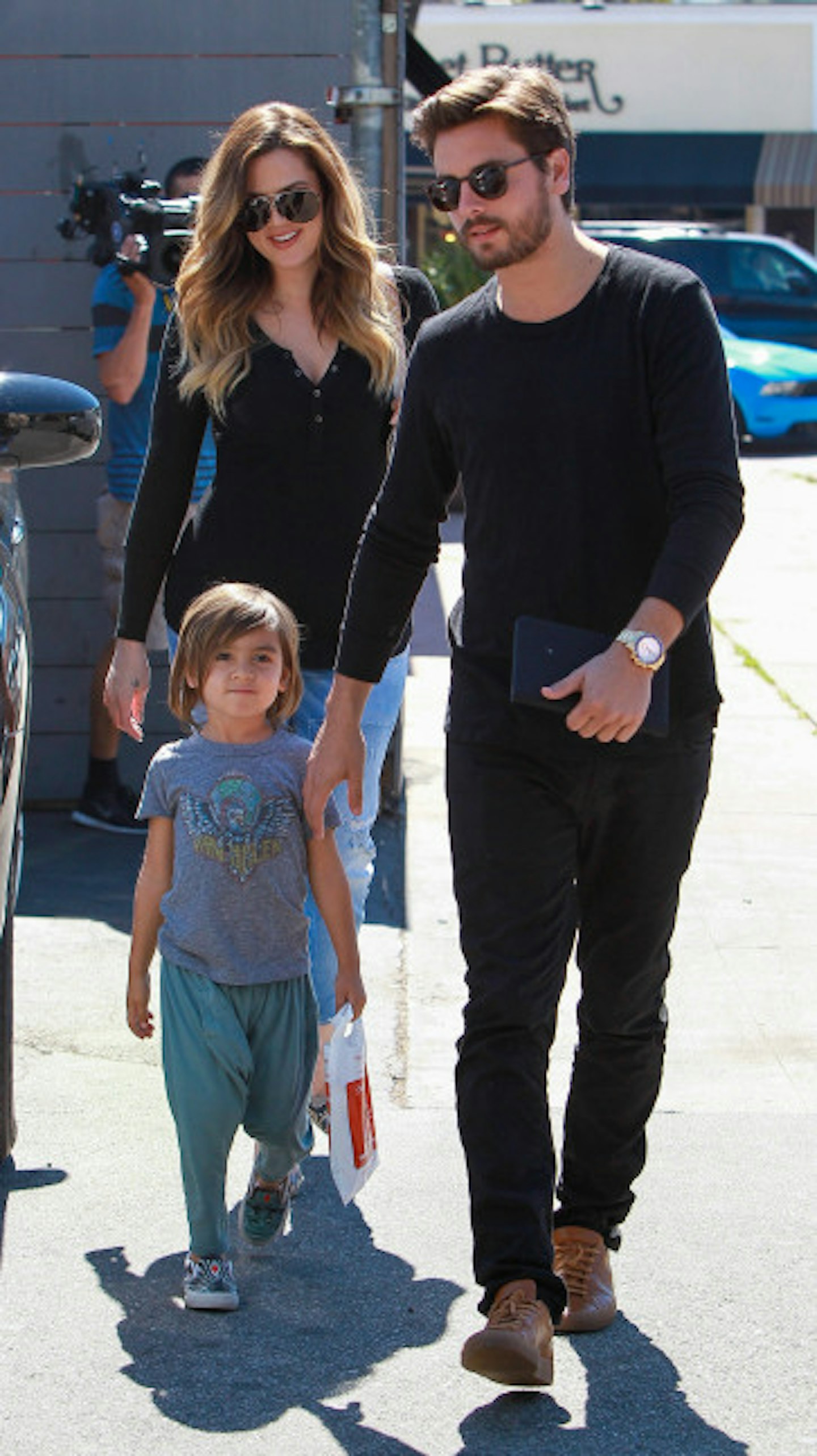 Khloe and Scott, pictured with Mason, are best friends