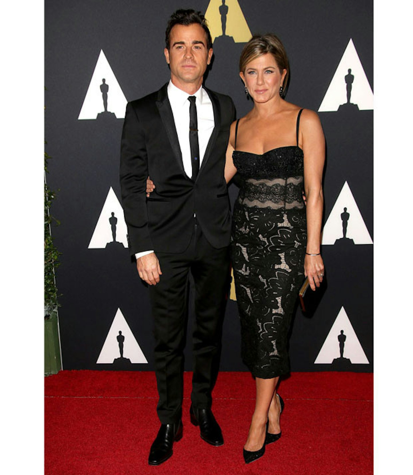 Justin Theroux and Jennifer Aniston wearing Zuhair Murad