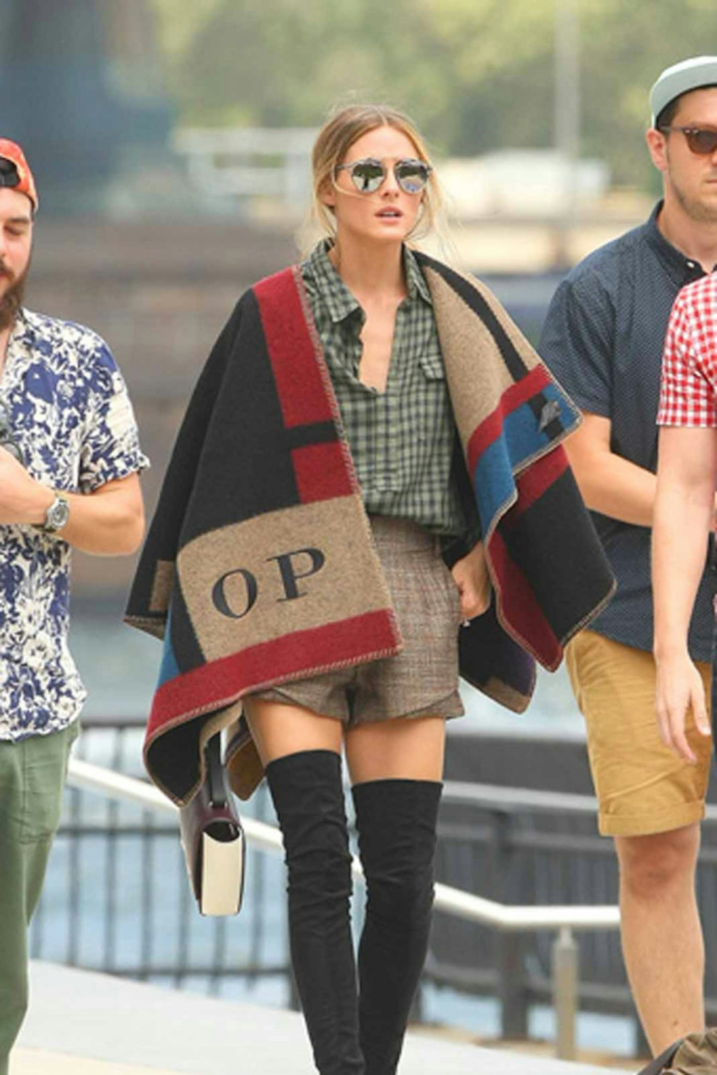 Who made Olivia Palermo's red patent handbag, blue print skirt, and black  boots? in 2023