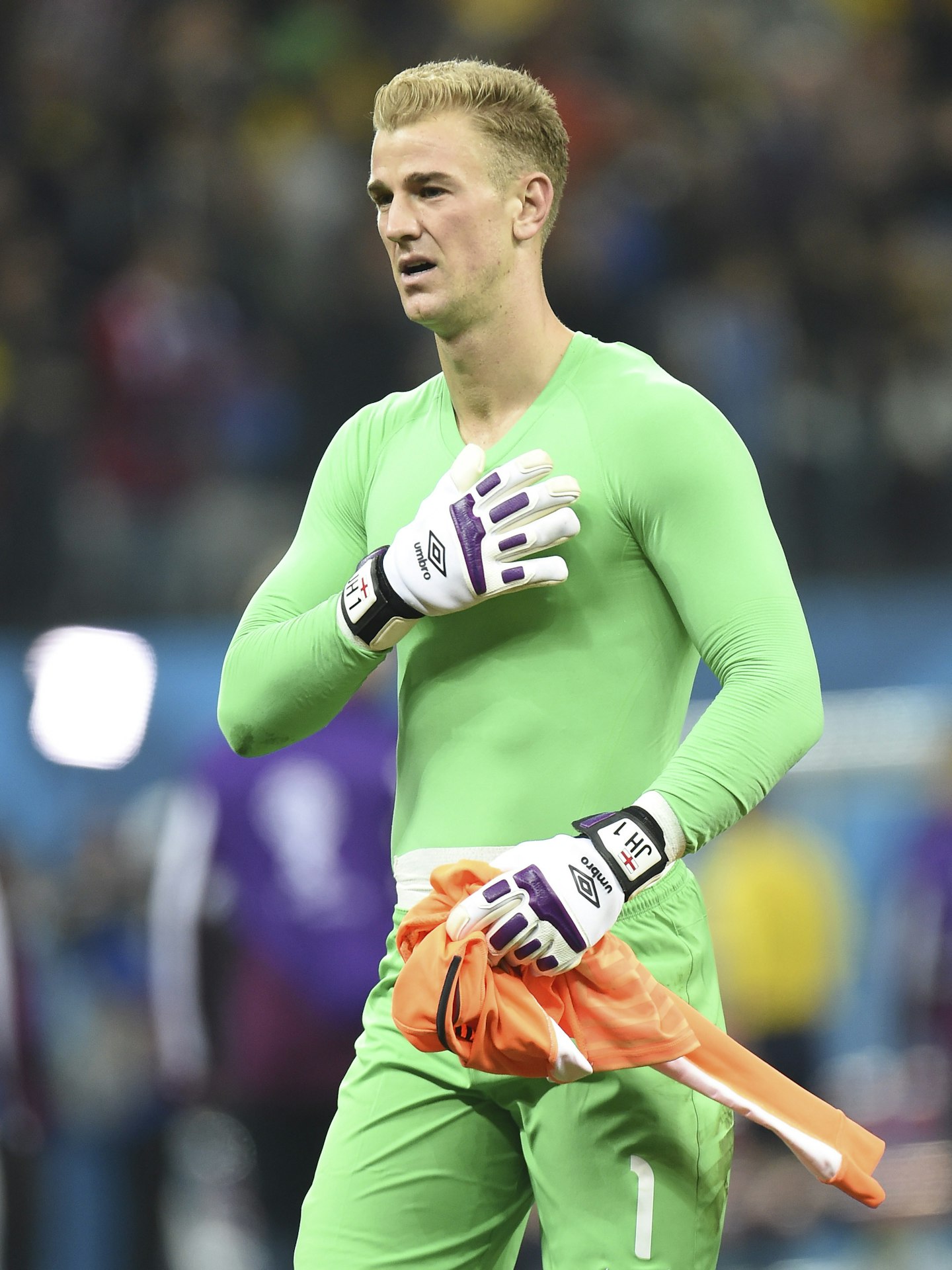 Joe playing for England in the World Cup 2014