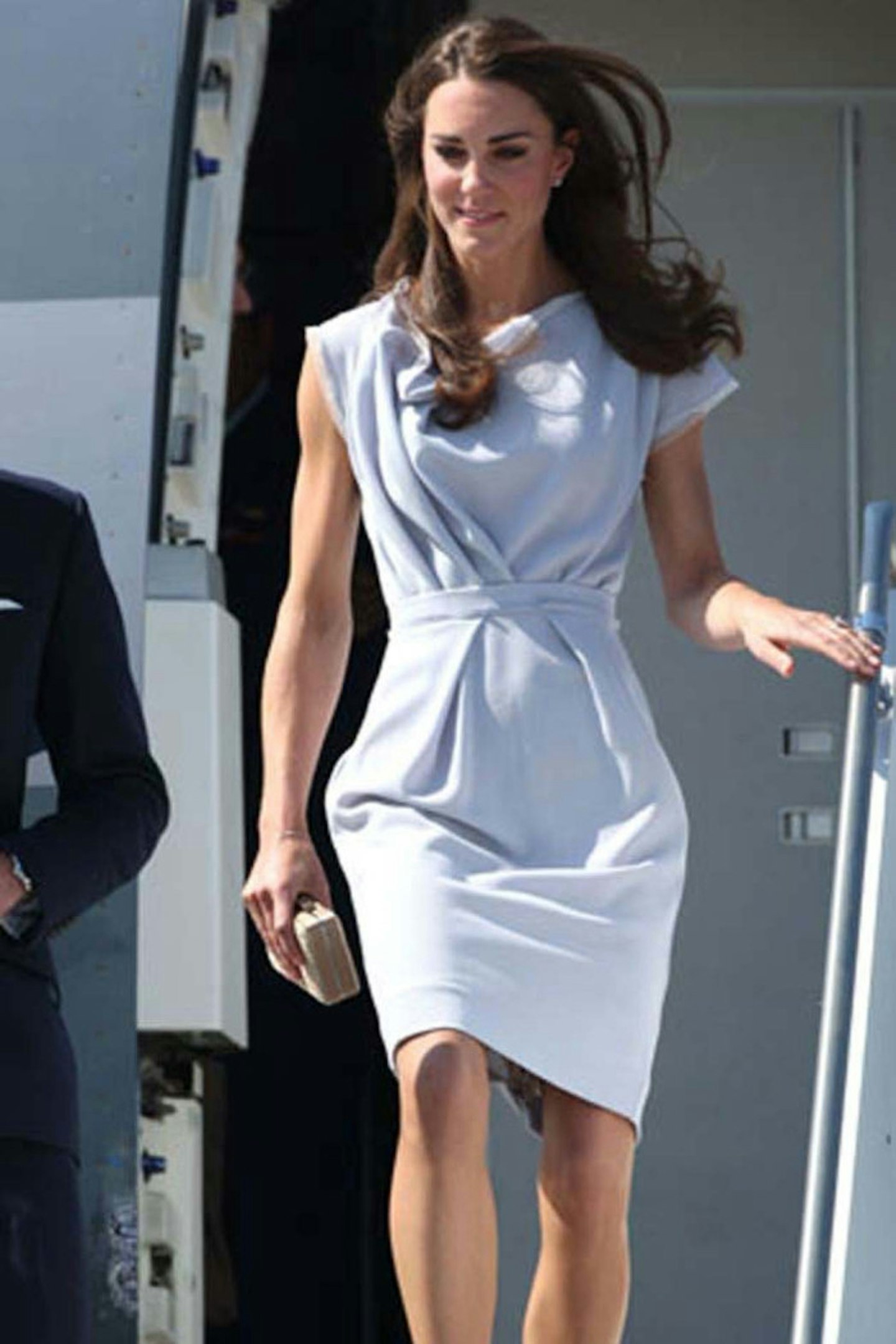 Kate Middleton emerging gracefully from a jet wearing Roksanda Ilincic, July 2011.