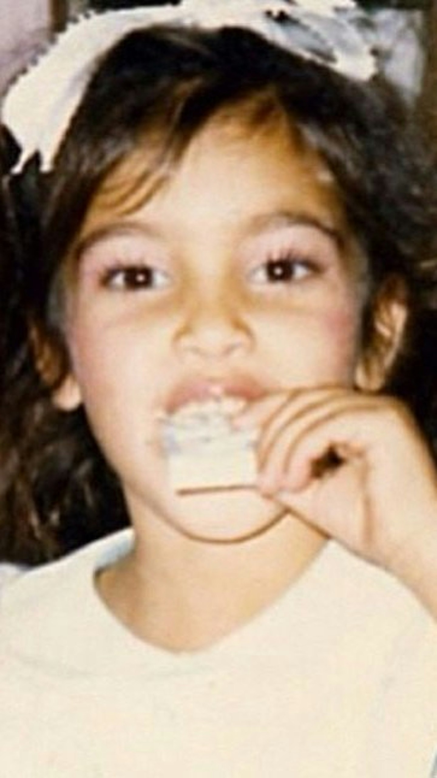 Kim looks the spitting image of North in this throwback pic.