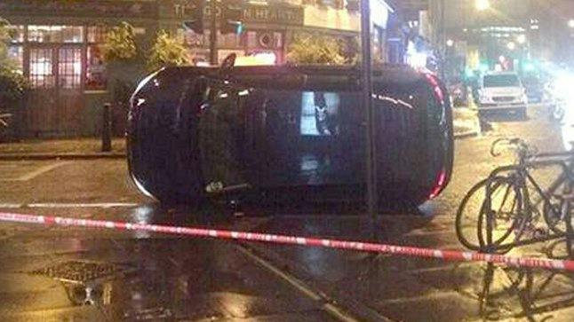 Hero bystanders pull car off trapped cyclist | Closer