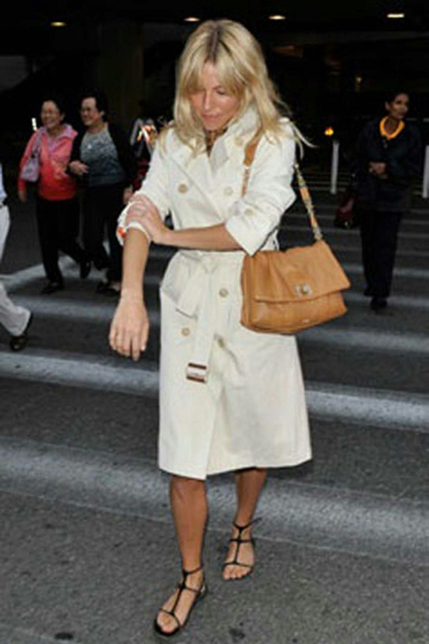 34- Sienna Miller in a TOD's trench coat, July 2010