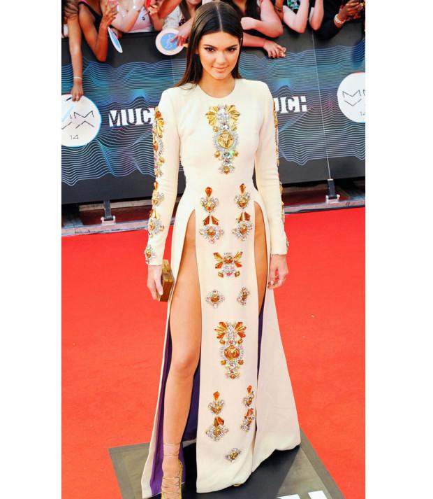 Kendall Jenner wears risqué dress with two splits up to her hip bones ...