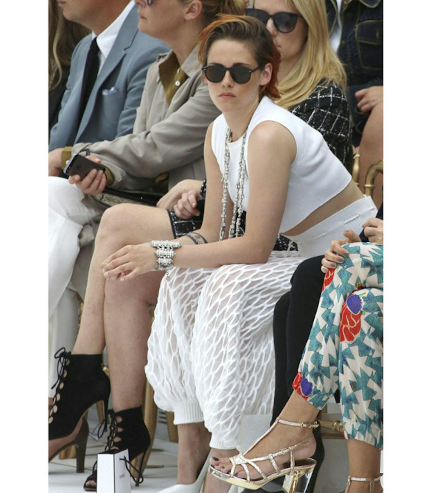 kristen-stewart-chanel-couture-show-aw-14-white-trousers-chains-shades