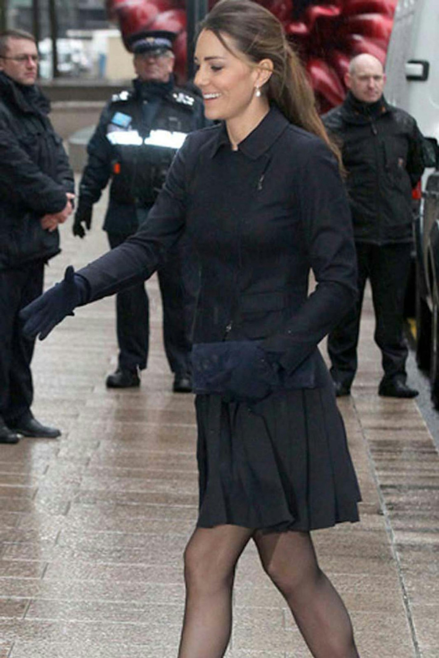 The Duchess of Cambridge in an Orla Kiely skirt and Max Mara jacket at a Place2Be charity event, 20 November 2013