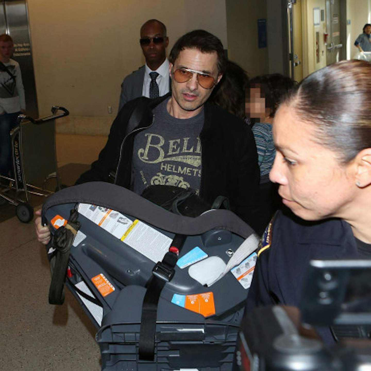 Olivier and Halle behind him at LAX