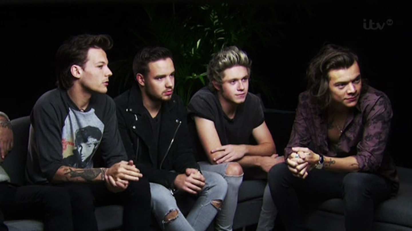 Harry was being interviewed with the rest of One Direction