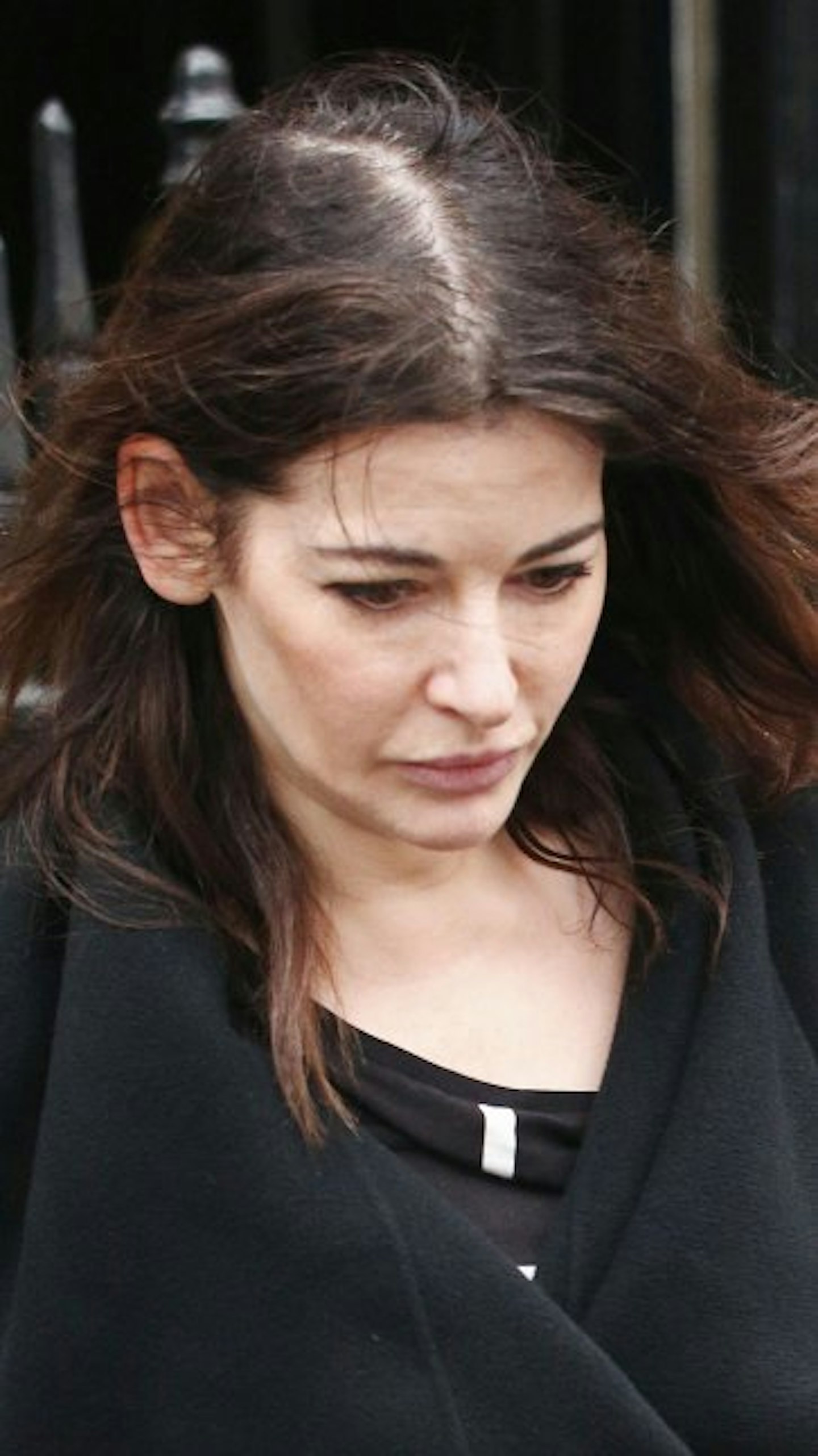 Nigella was pictured looking strained earlier this year following her divorce