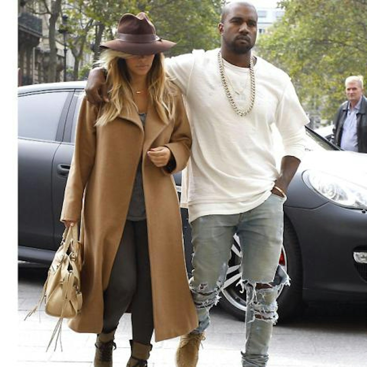 Kanye and Kim arriving in Paris on Saturday