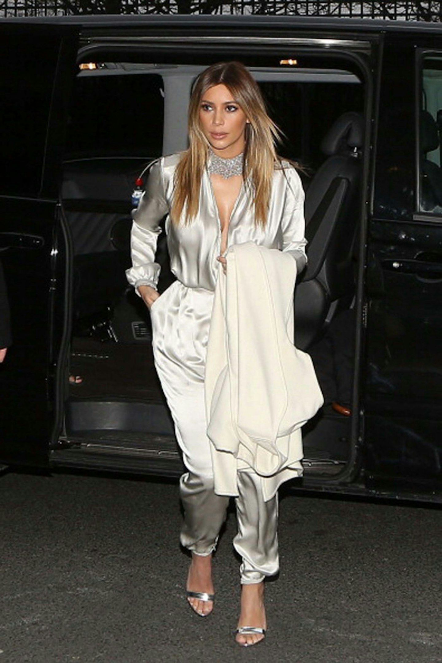 Kim Kardashian style silver jumpsuit