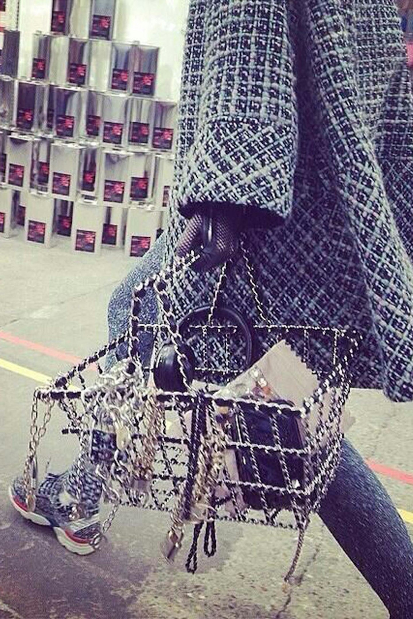 Fall's must-have Chanel bag- a metal grocery basket trimmed in leather interlaced gold chain links!!!