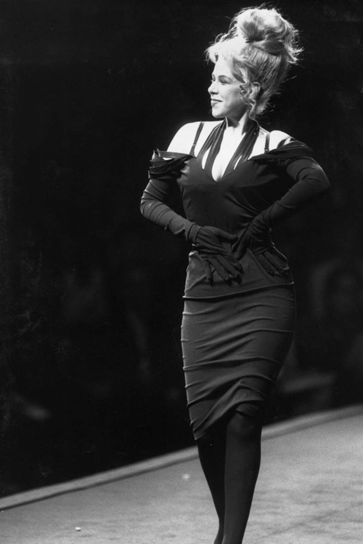 Socialite Diane Brill takes a prime spot on the runway in 1989.