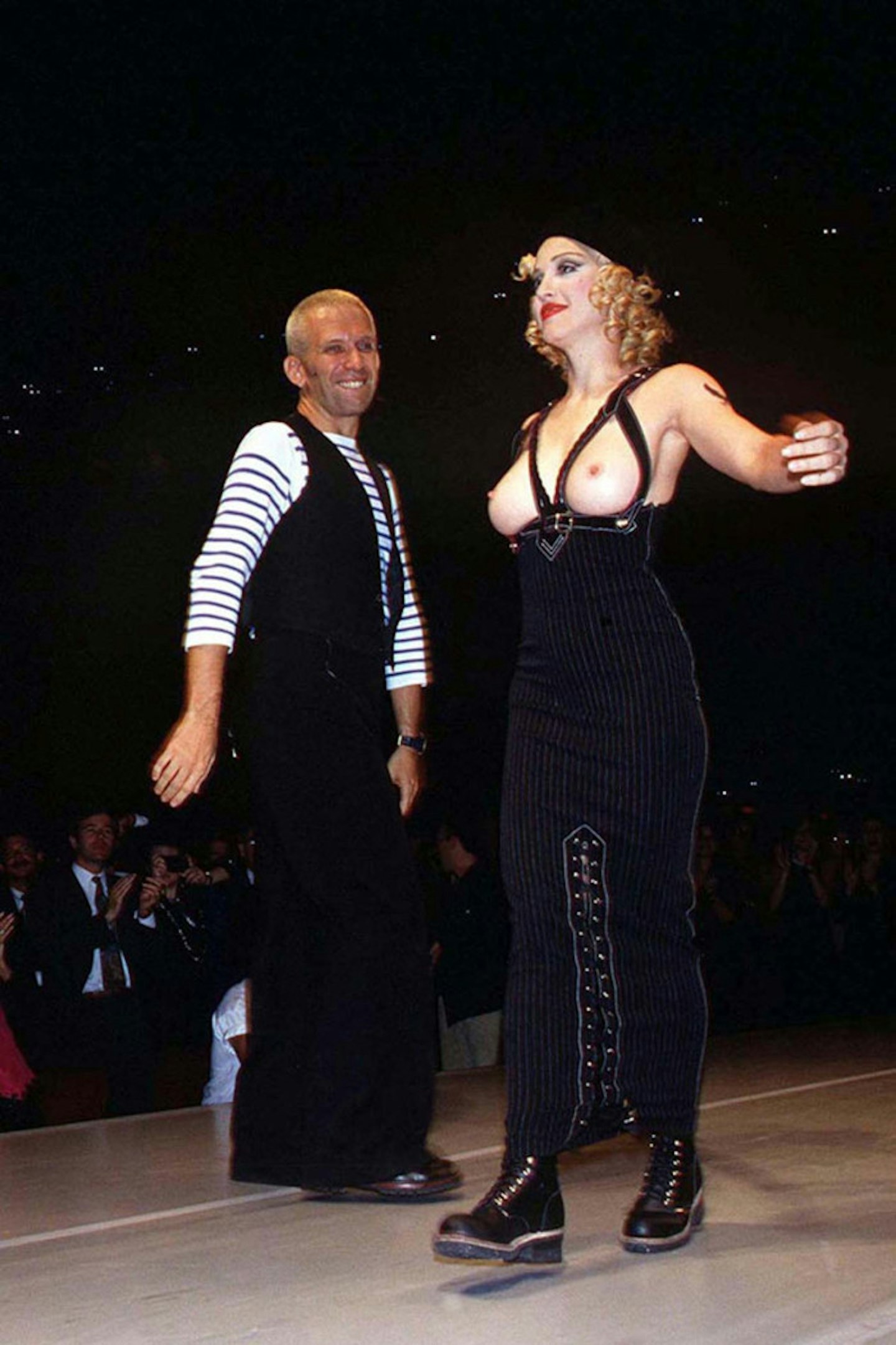 A casual topless stroll down the runway for Madonna in 1992.
