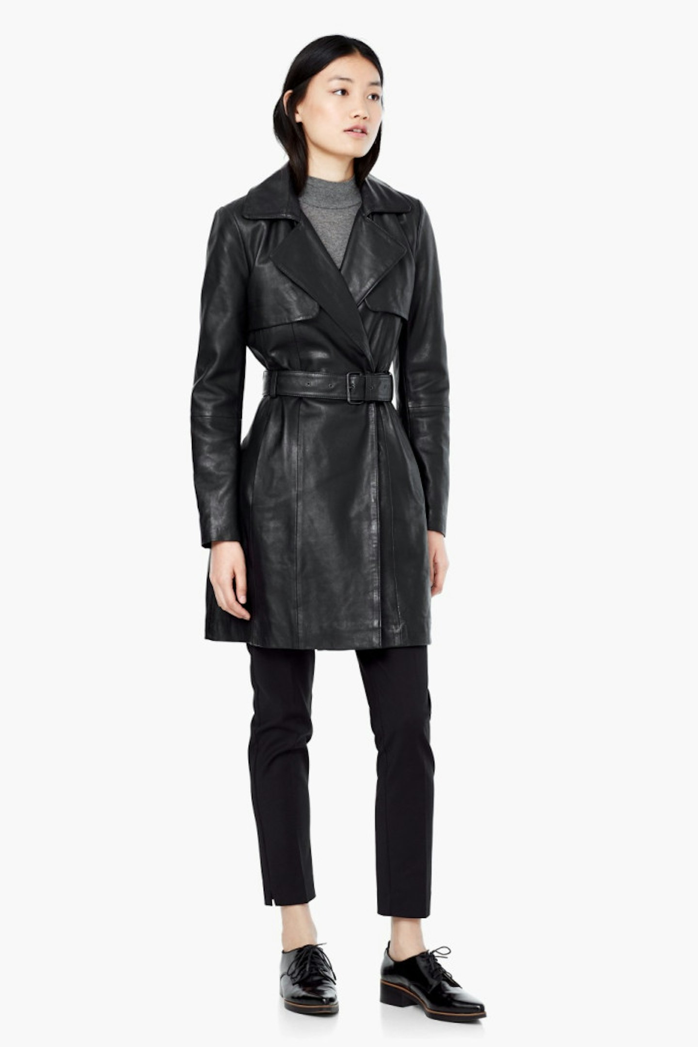 Update your wardrobe with this sleek black leather trench