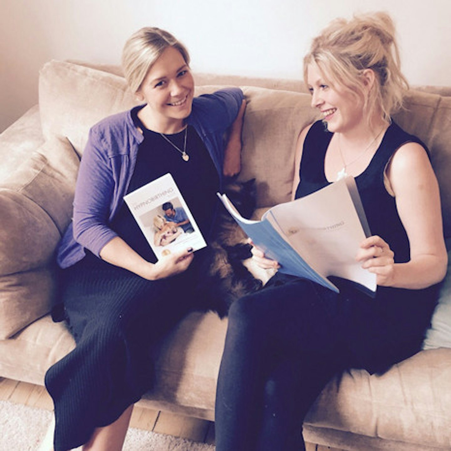 Suzanne with Lacey, swotting up on hypnobirthing!