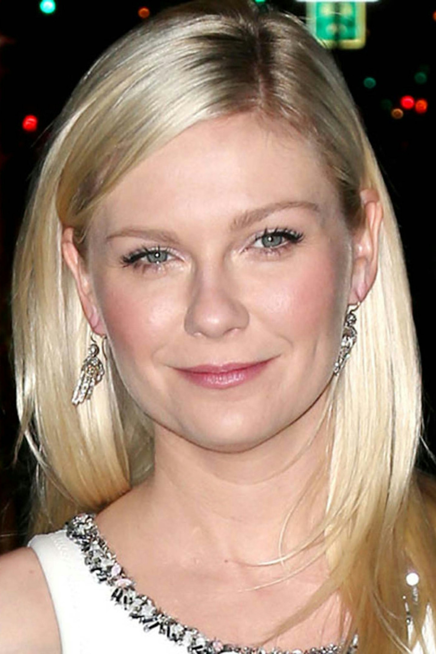 Invest in a shine spray for radiant tresses like Kirsten Dunst